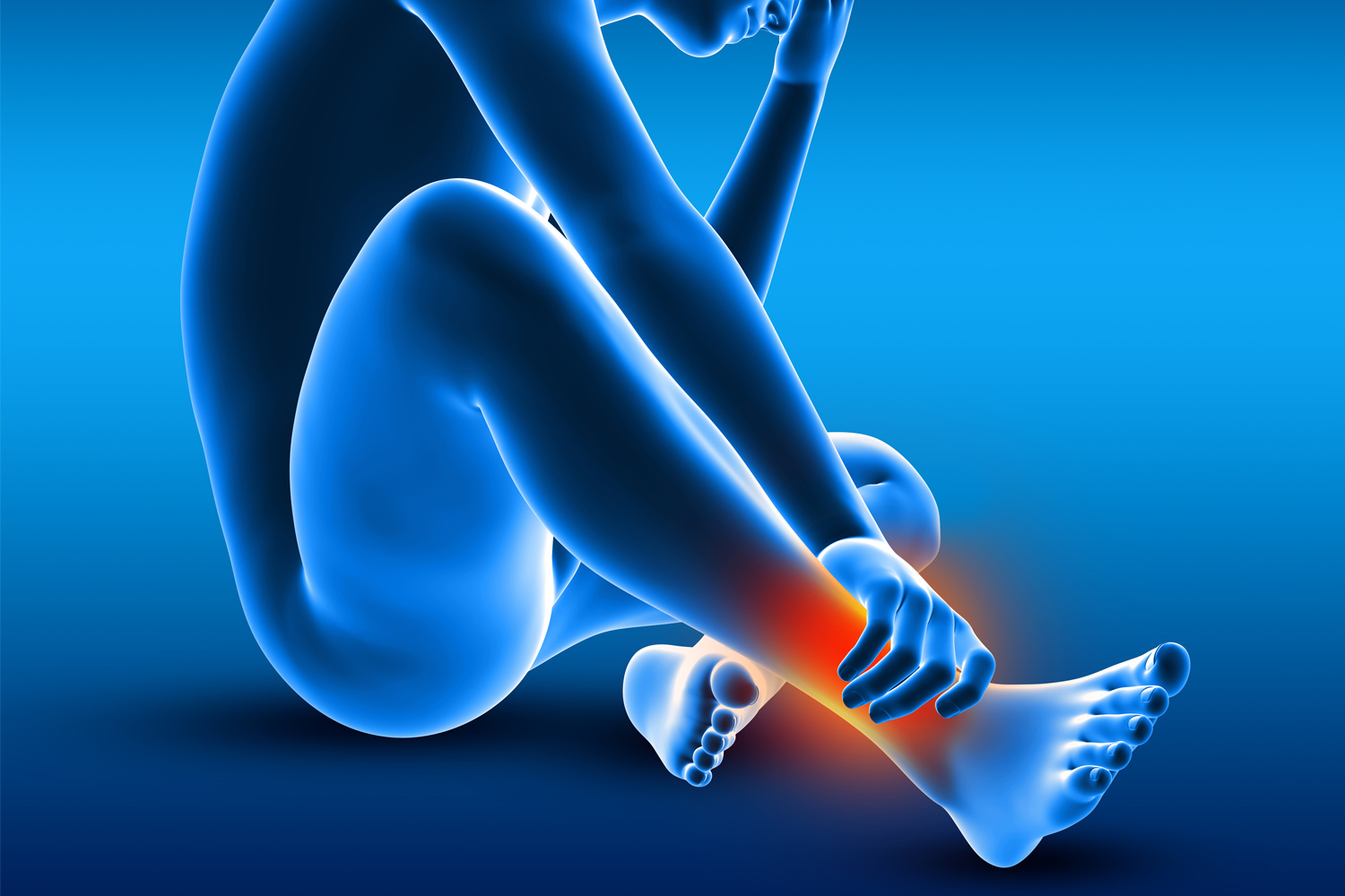 Close-up of female athlete holding her ankle in pain after exercising in health club.